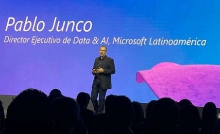 Pablo Junco speaking on stage at a conference.